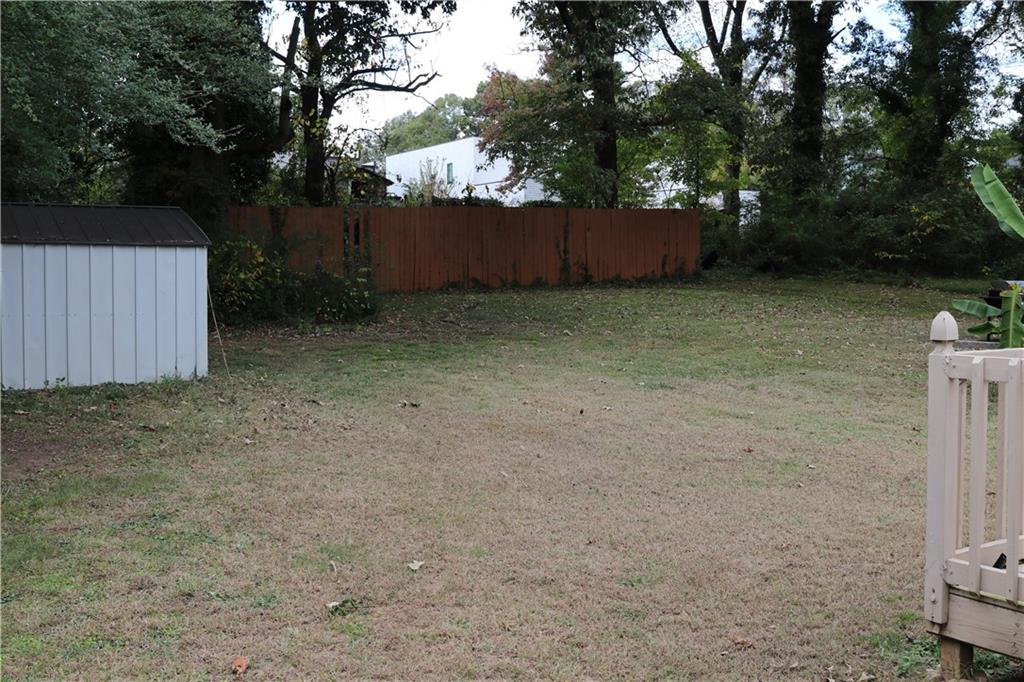 1097 Fortress Avenue Southwest Atlanta, GA 30315 - Photo 35 of 39 a backyard of a house with lots of green space
