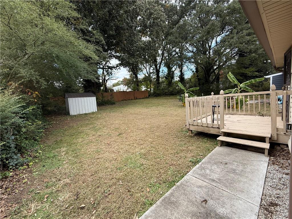 1097 Fortress Avenue Southwest Atlanta, GA 30315 - Photo 37 of 39 a view of a bench in a backyard