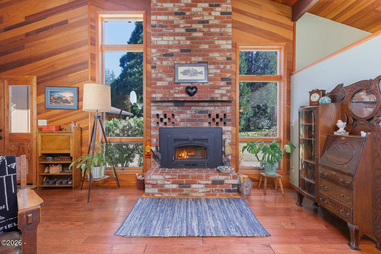 871 Old River Road Northeast Siletz, OR 97380 - Photo 13 of 86 Living room and Fireplace insert
