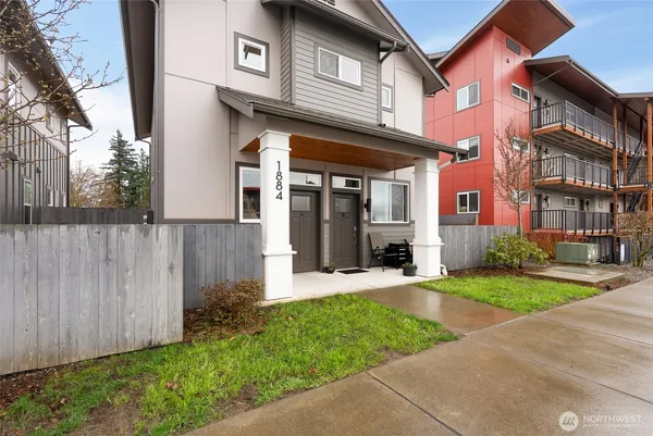 a view of a building with a yard