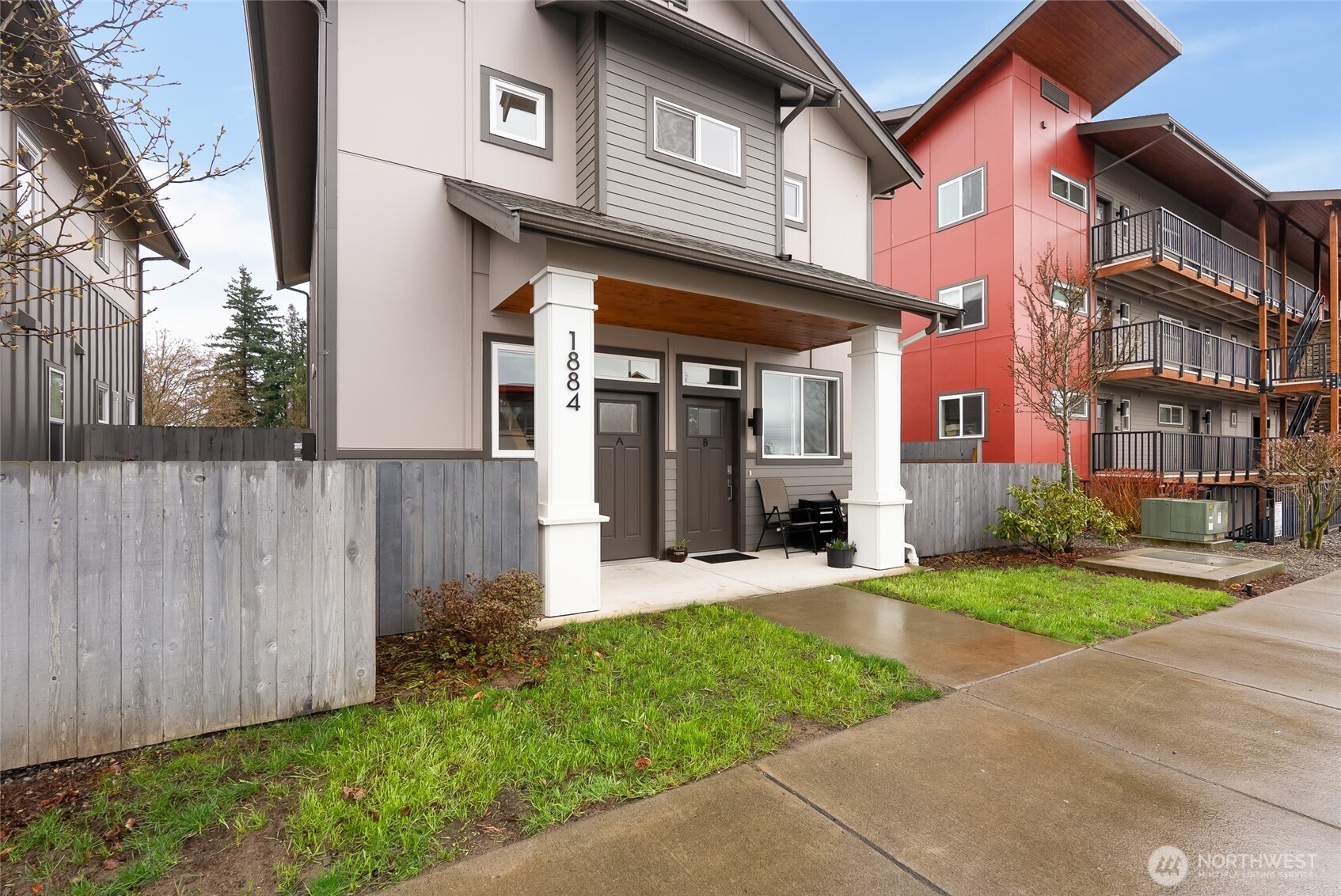 1884 Front Street, Unit B Lynden, WA 98264 - Photo 3 of 14 a view of a building with a yard
