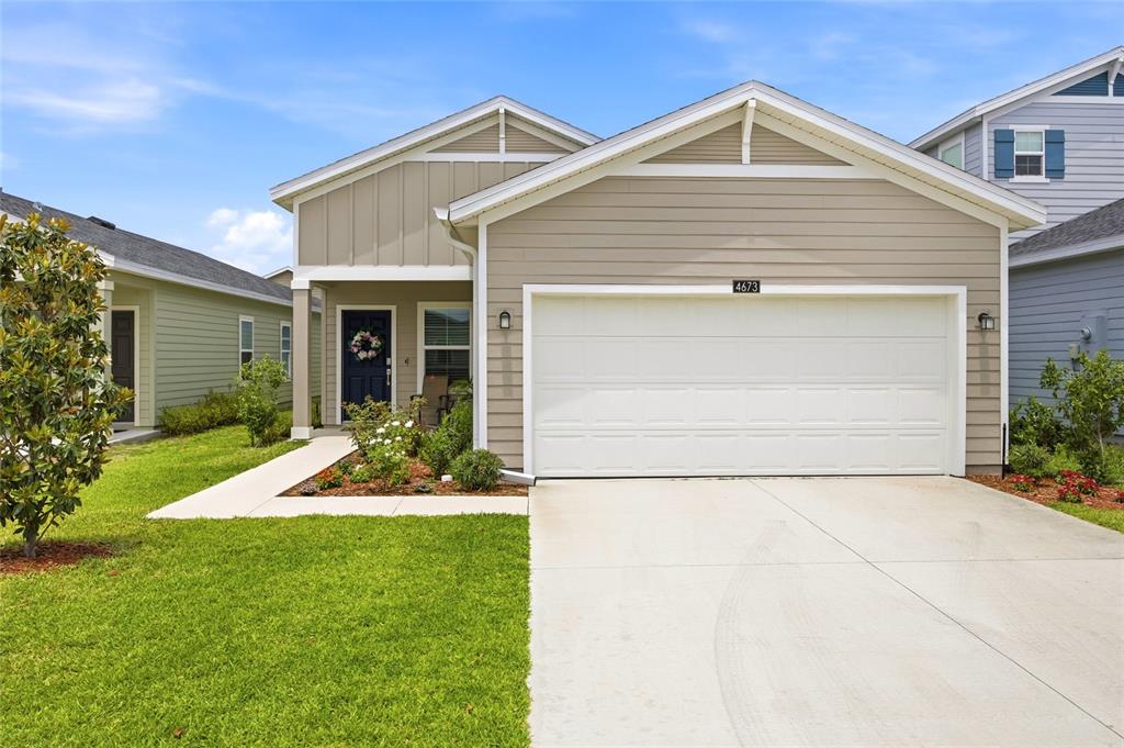 4673 Southwest 84th St Road Ocala, FL 34476 - Photo 1 of 1 a front view of house with a garden