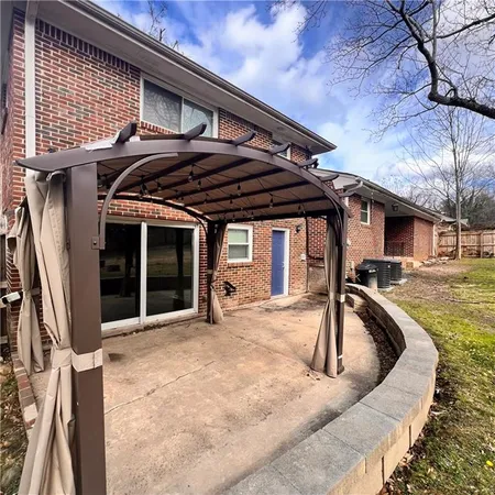 a house view with a outdoor space