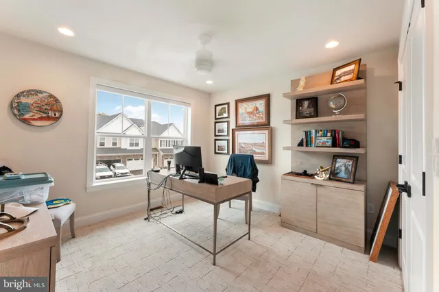 a workspace with furniture and window