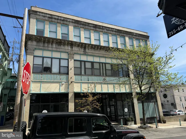 a front view of a building with street