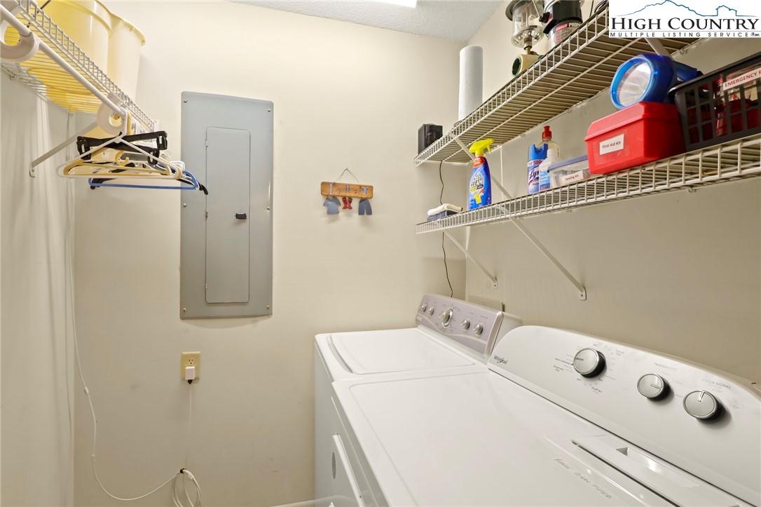 311 Pine Ridge Road Beech Mountain, NC 28604 - Photo 32 of 37 a utility room with dryer and washer