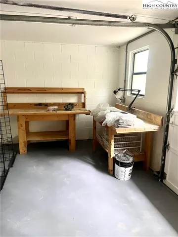 a view of a wooden deck with a yard