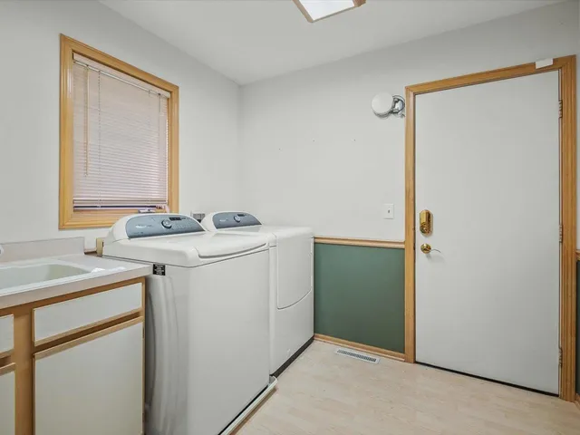 a house view with a garden space