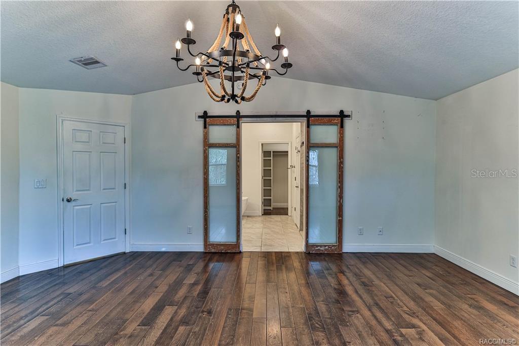 110 North Rooks Avenue Inverness, FL 34453 - Photo 16 of 34 a view of a livingroom with wooden floor