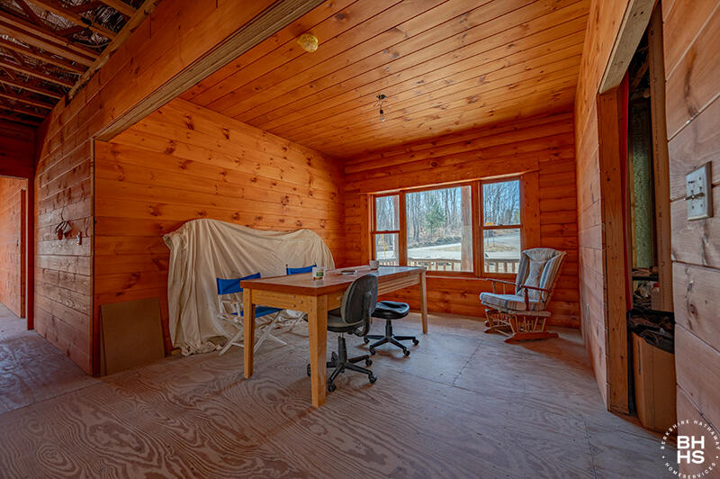 667 Days Mills Road St. Regis Falls, NY 12980 - Photo 16 of 51 HomeOnLakeOzoniaOutlet_Room_With_Table