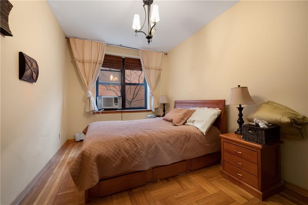 3045 Ocean Parkway, Unit 2D Brooklyn, NY 11235 - Photo 5 of 10 a bedroom with a bed and window