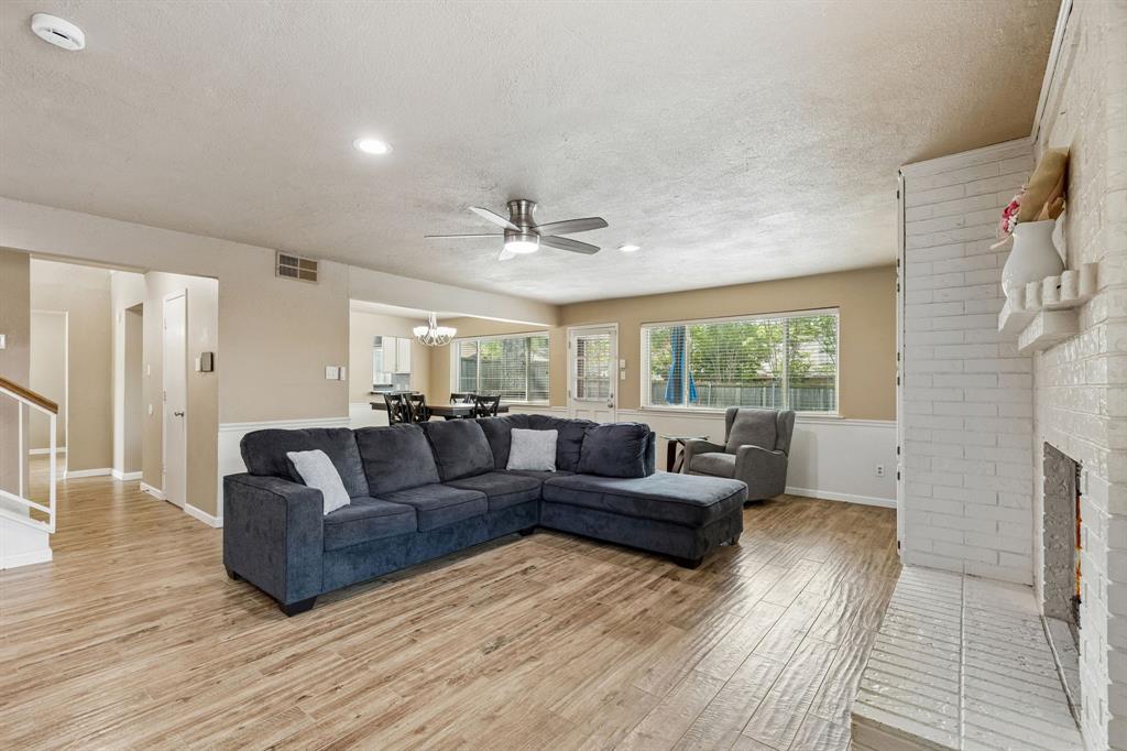 304 Lark Lane Euless, TX 76039 - Photo 9 of 32 a living room with furniture and a large window