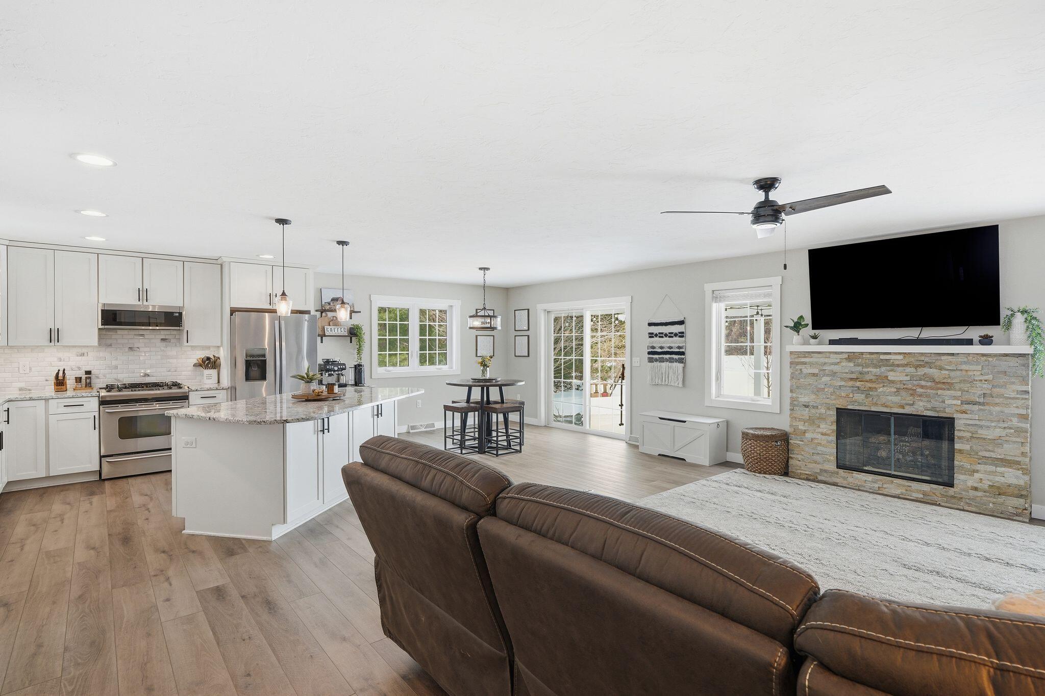 307 Scuppernong Circle Dousman, WI 53118 - Photo 2 of 39 Kitchen and Living Room