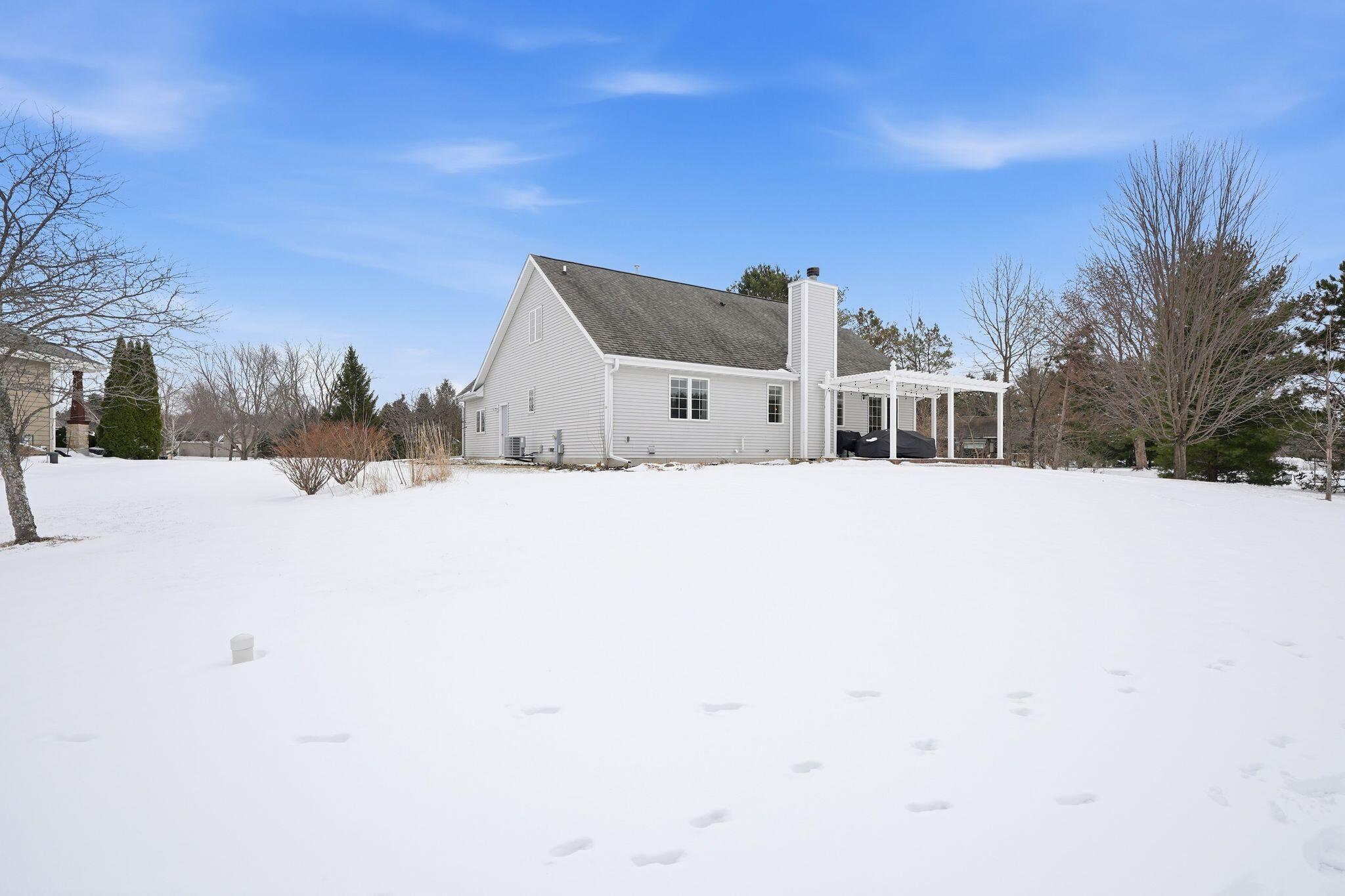 307 Scuppernong Circle Dousman, WI 53118 - Photo 29 of 39 Rear Exterior