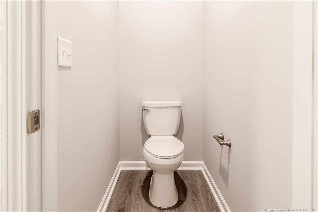 260 Carolina Church Road St. Pauls, NC 28384 - Photo 31 of 32 a white toilet sitting in a bathroom