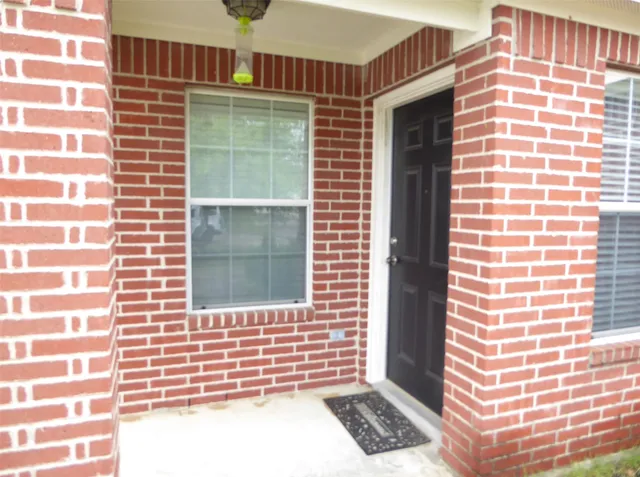a view of a balcony and a window