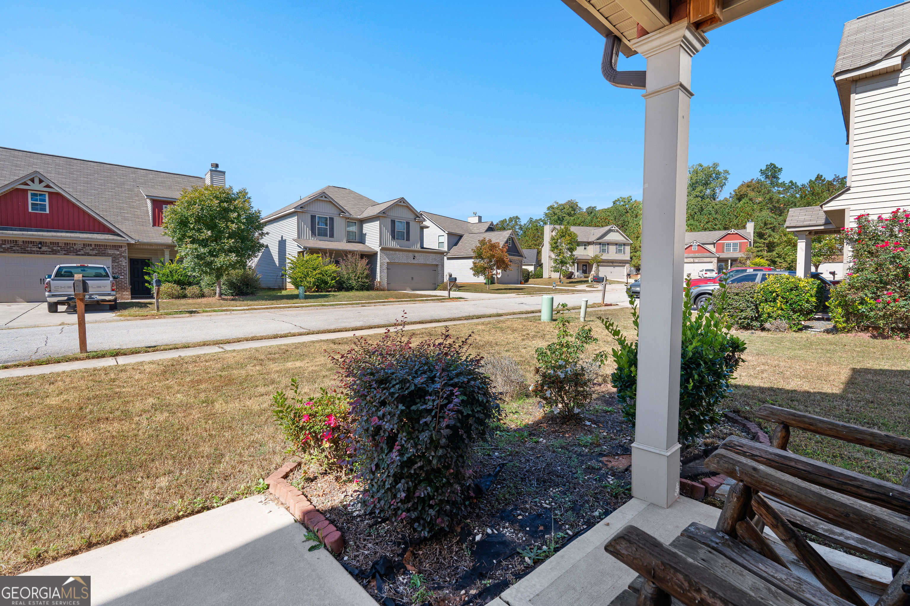 112 Truman Court Jackson, GA 30233 - Photo 4 of 41 a view of a city with tall buildings