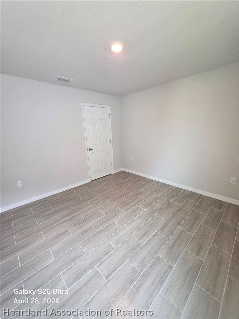 1613 Marble Street Sebring, FL 33870 - Photo 15 of 20 wooden floor in a room