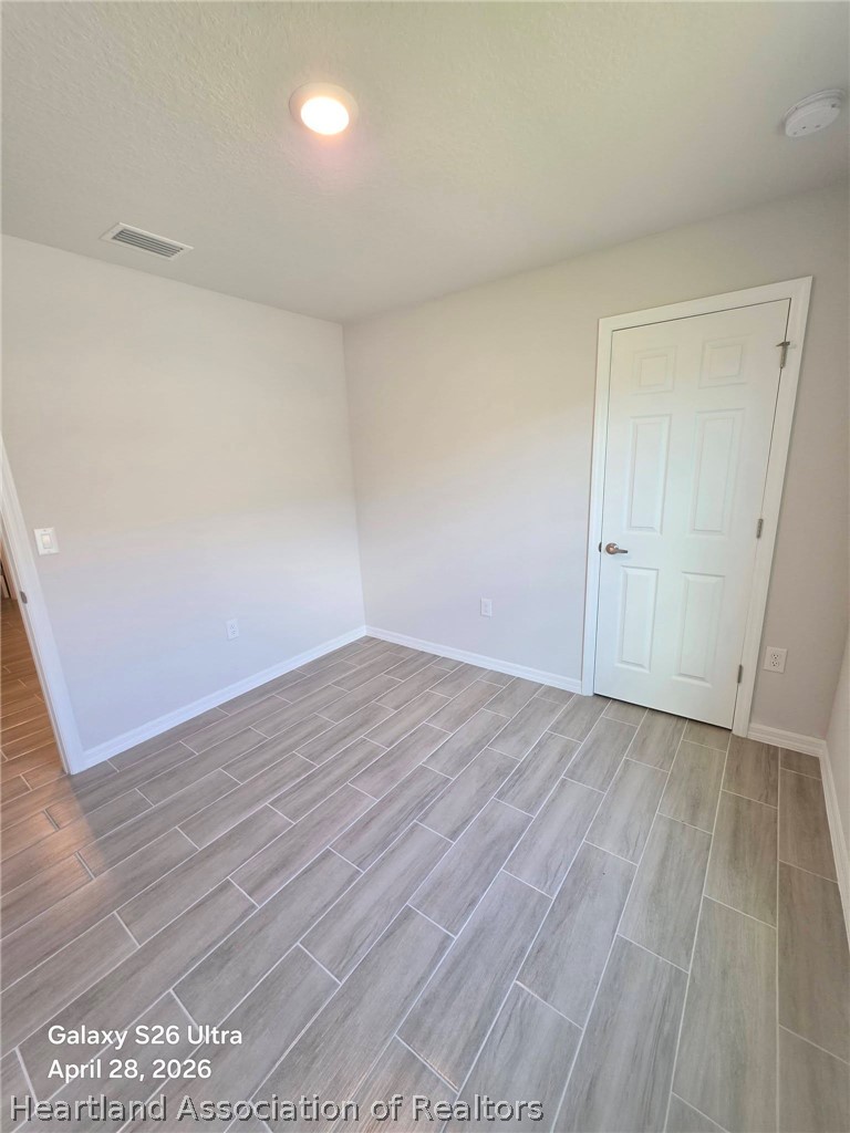 1613 Marble Street Sebring, FL 33870 - Photo 17 of 20 wooden floor in a room