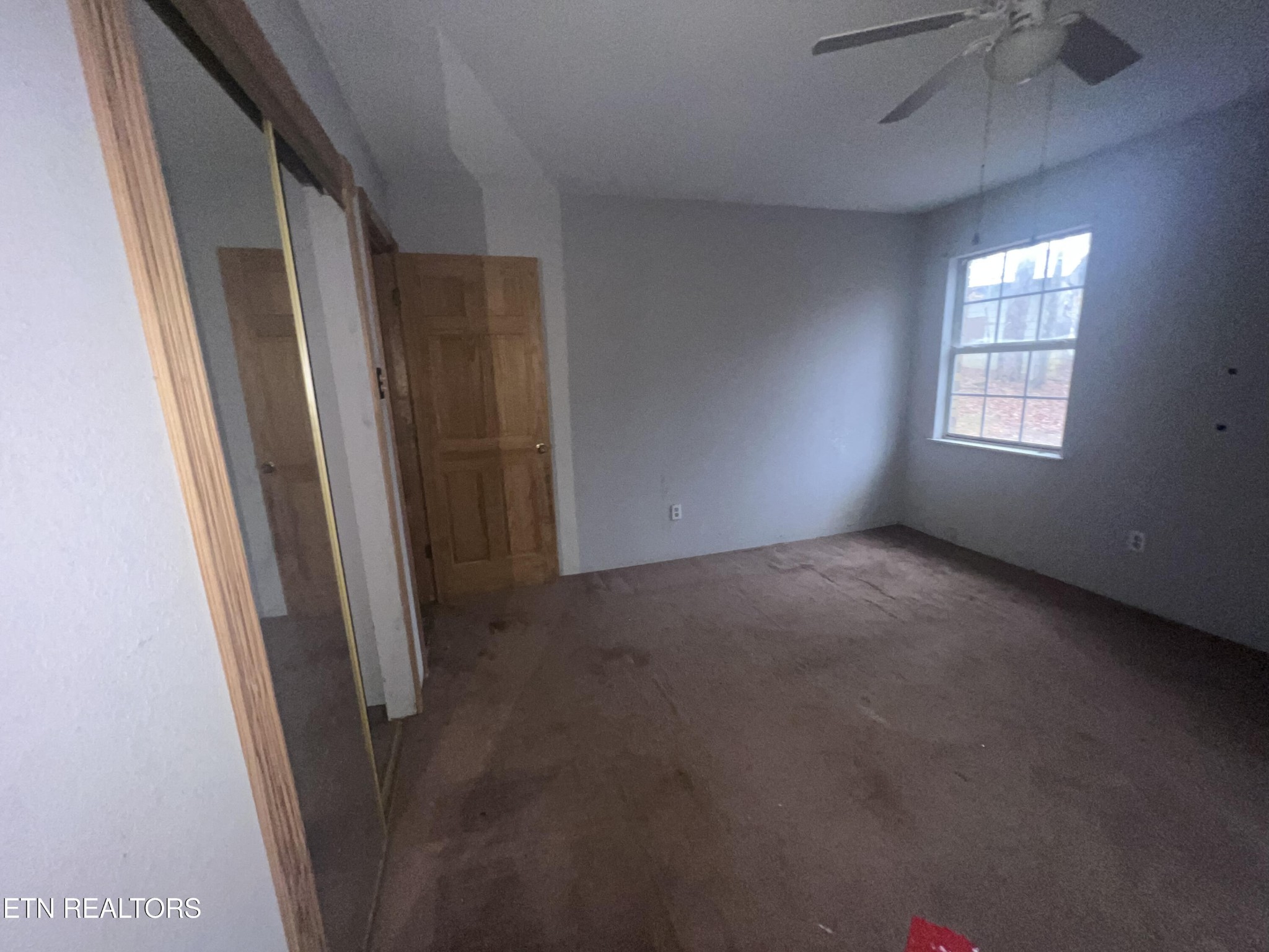 720 Poplar Lane Winfield, TN 37892 - Photo 14 of 19 an empty room with windows