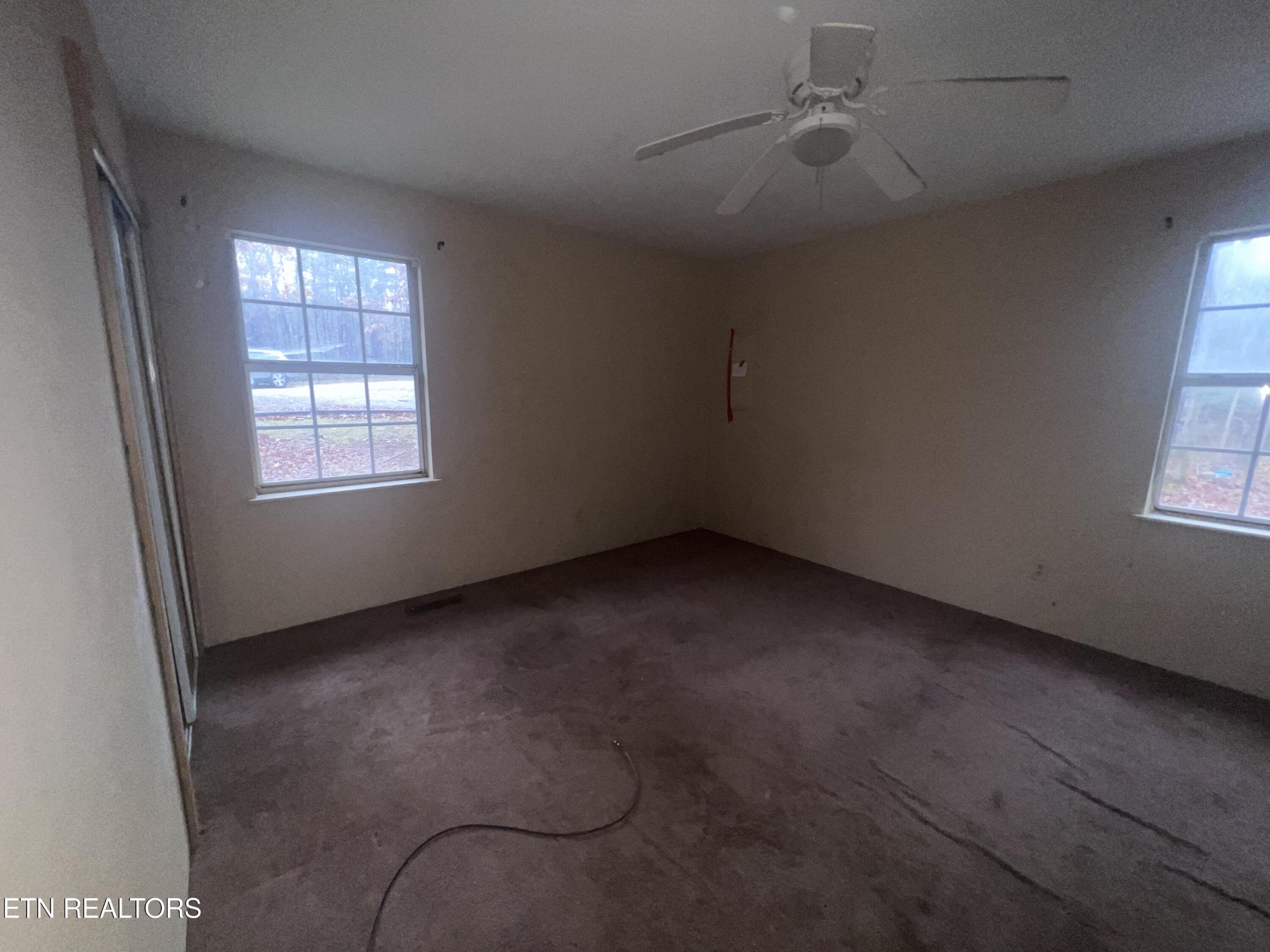 720 Poplar Lane Winfield, TN 37892 - Photo 15 of 19 an empty room with windows