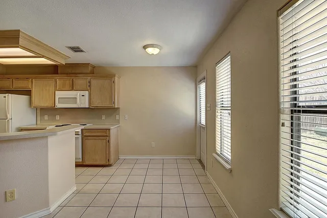 a view of an empty room with window