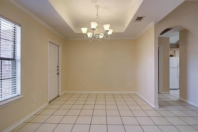 a view of an empty room with window