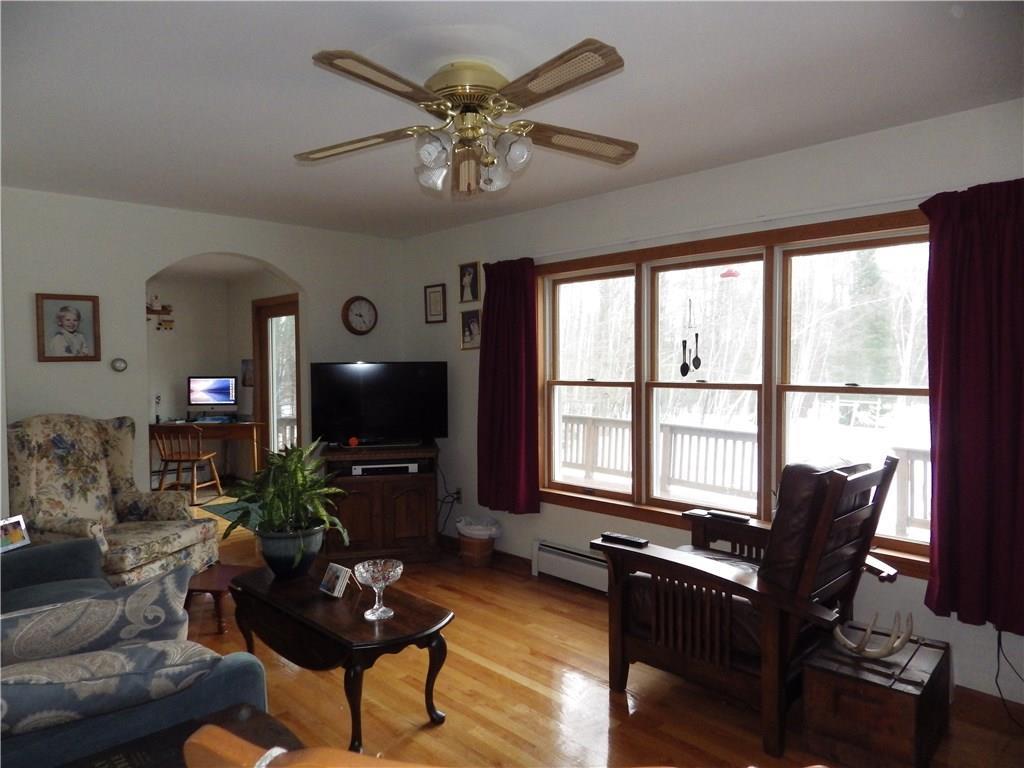 492 Belgrade Road Oakland, ME 04963 - Photo 12 of 32 Family room with wood floors...