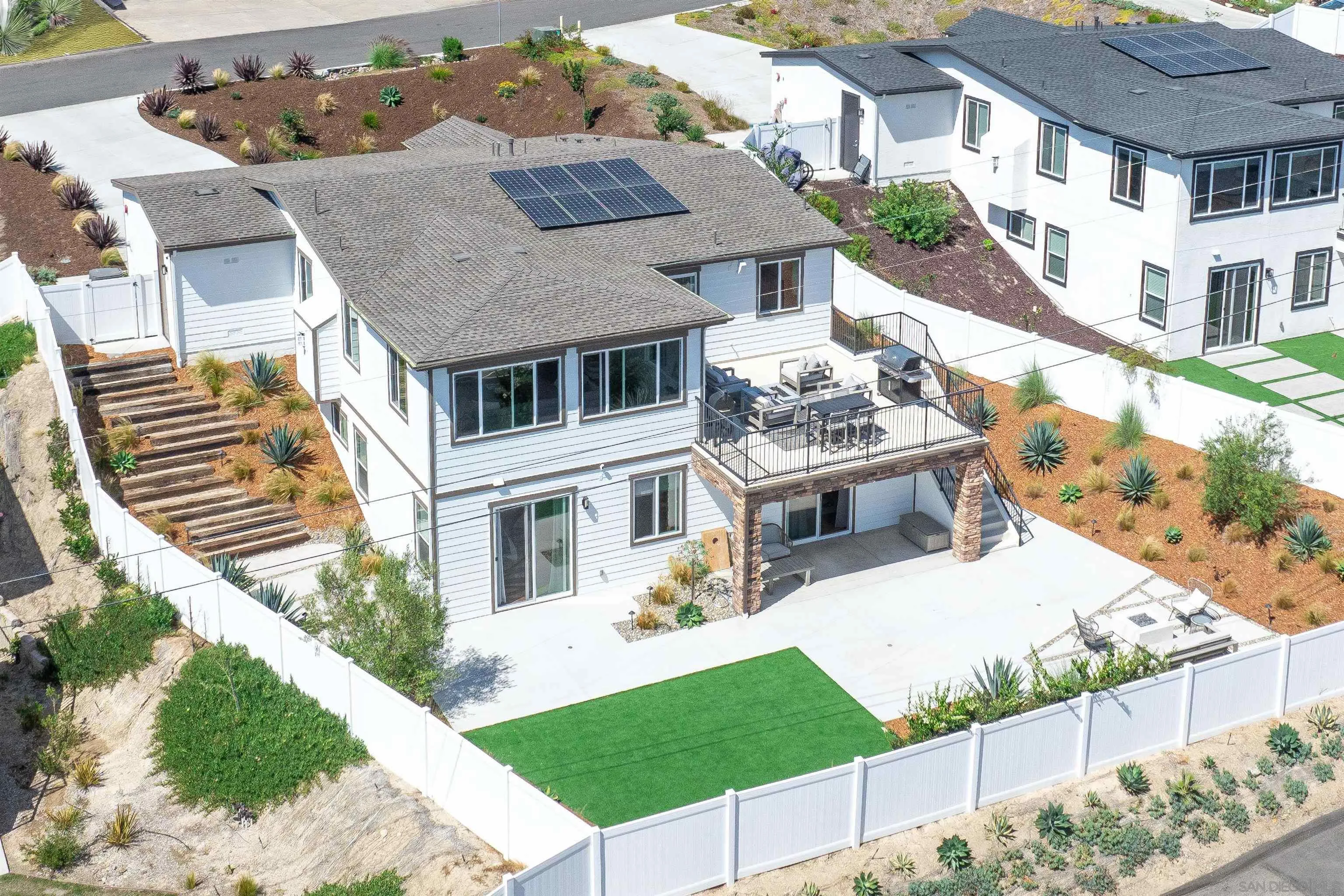 1856 Avocado Road Oceanside, CA 92054 - Photo 41 of 45 a front view of a house with a yard