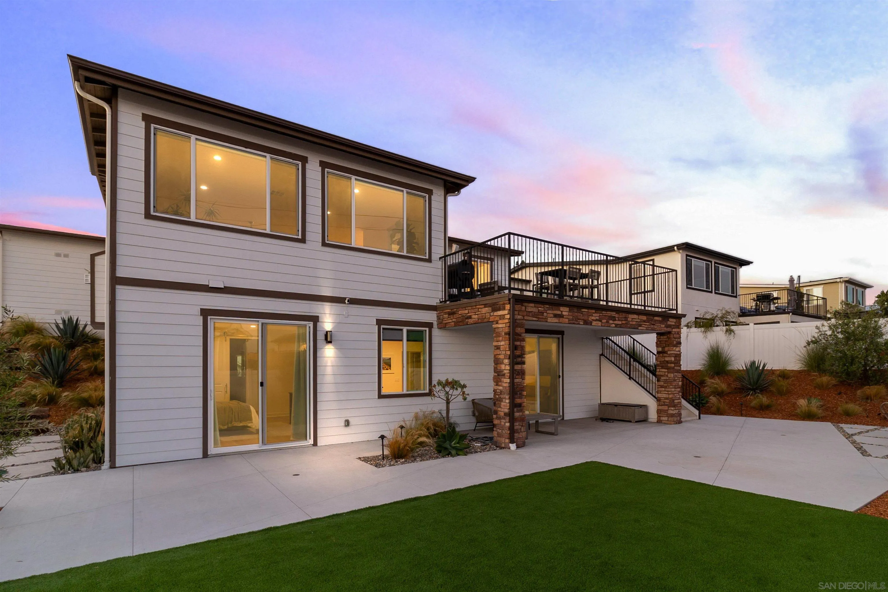 1856 Avocado Road Oceanside, CA 92054 - Photo 42 of 45 a front view of a house with a yard