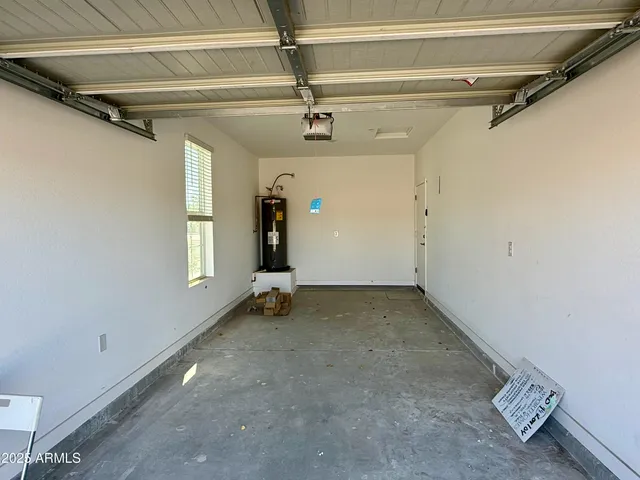 a view of a room with rack and windows