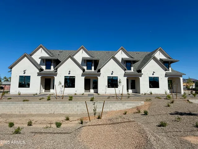 a view of white house with a outdoor space