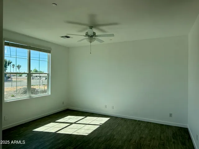 an empty room with windows