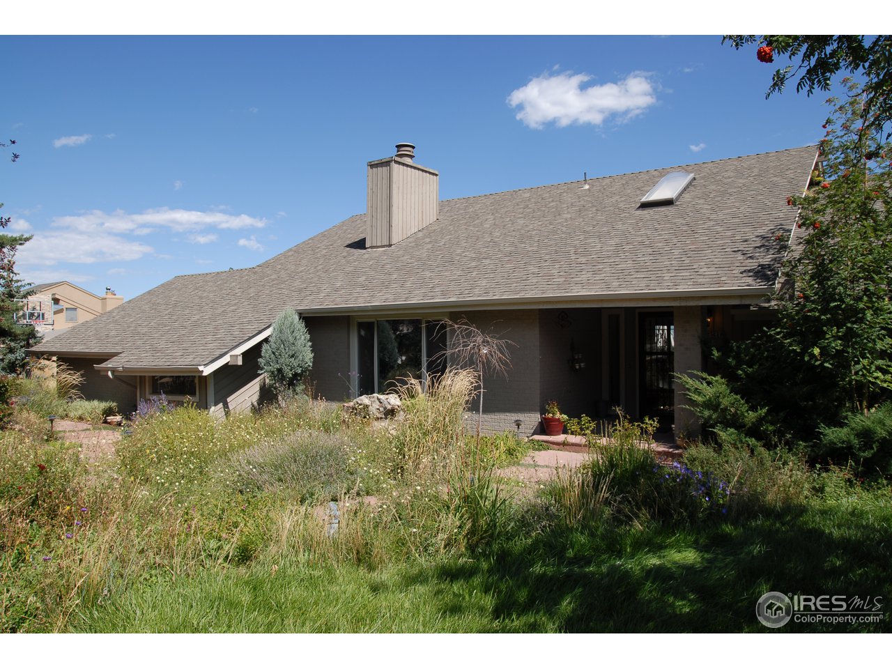 3830 Spring Valley Road Boulder, CO 80304 - Photo 16 of 18 a aerial view of a house with yard and trees