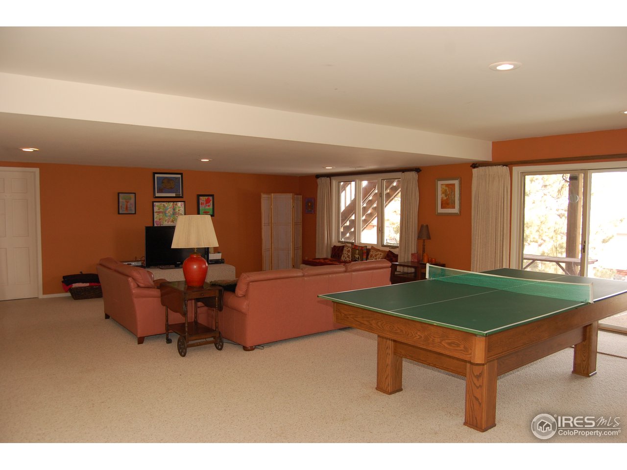 3830 Spring Valley Road Boulder, CO 80304 - Photo 4 of 18 a living room with furniture a window and a table