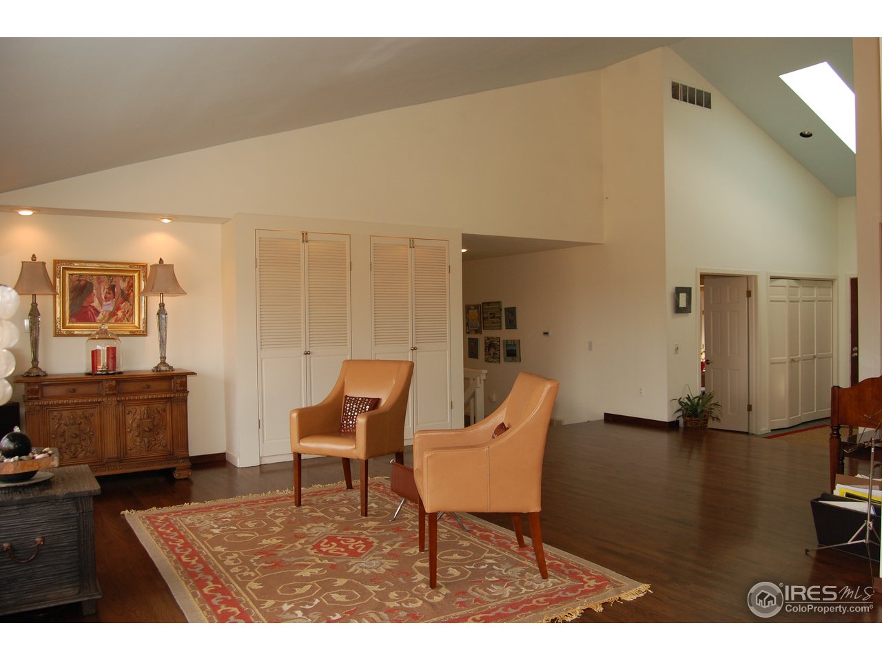 3830 Spring Valley Road Boulder, CO 80304 - Photo 8 of 18 a living room with furniture and wooden floor