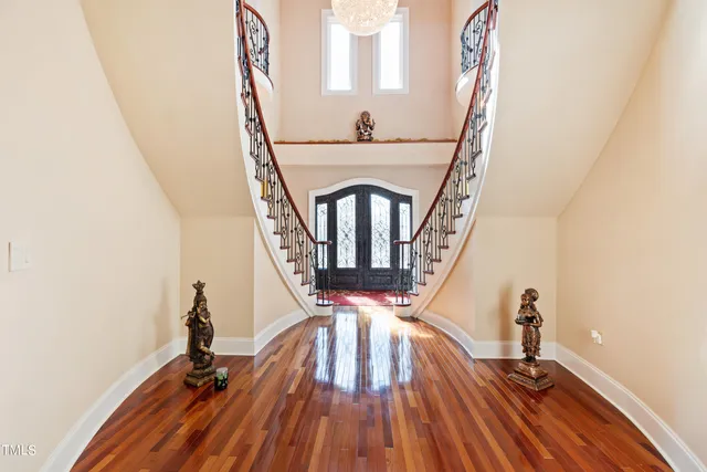 a kitchen with stainless steel appliances granite countertop white cabinets sink and dishwasher