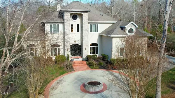 a view of a building with a yard