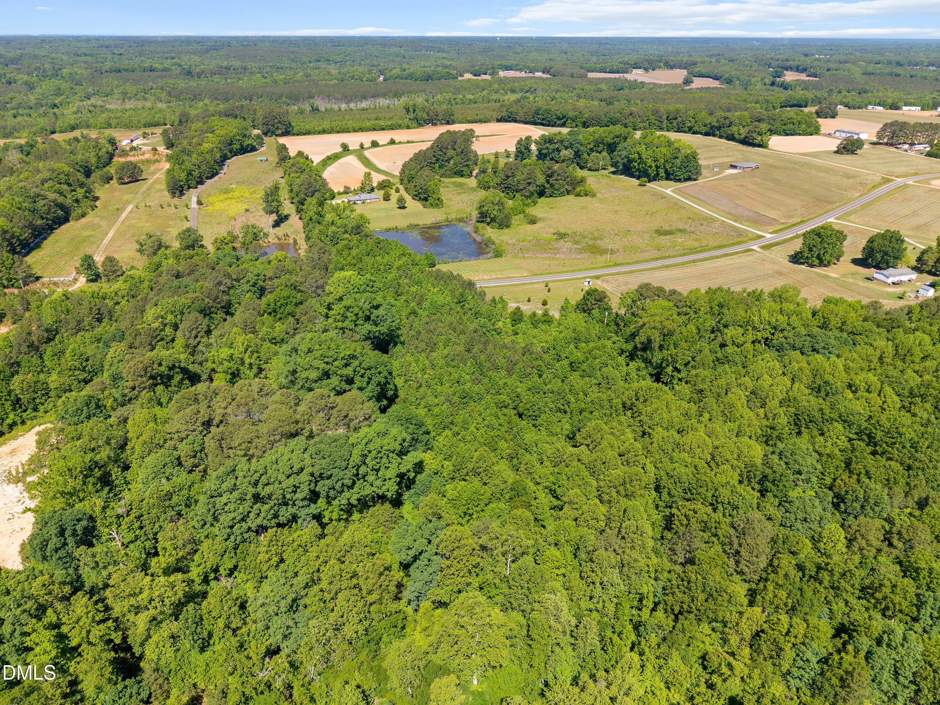 1000 Richardson Road Zebulon, NC 27597 - Photo 8 of 14 a view of an ocean and a mountain view