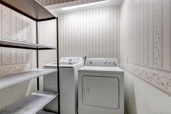 a utility room with dryer and washer