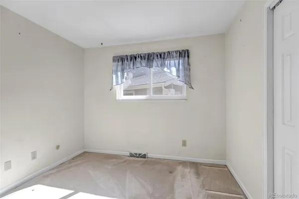 an empty room with a window