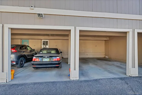 a car parked in front of garage