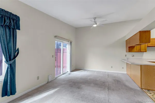 a view of a storage & utility room with a window