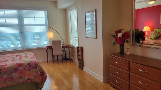 a bathroom with a shower and a window