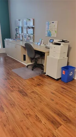 a view of workspace and wooden floor in windows