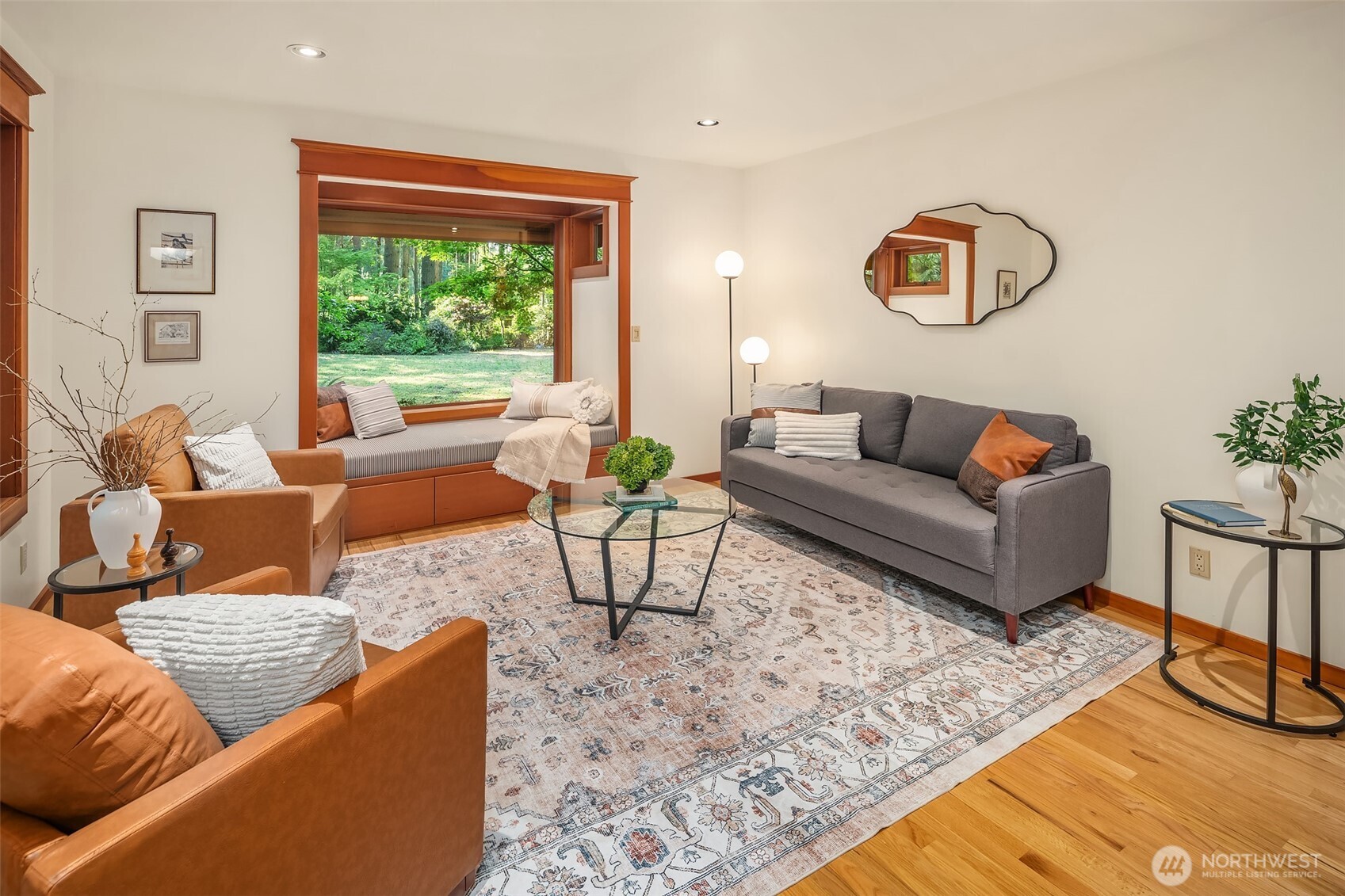 17804 Thorsen Road Southwest Vashon, WA 98070 - Photo 11 of 39 a living room with furniture a rug and a large window