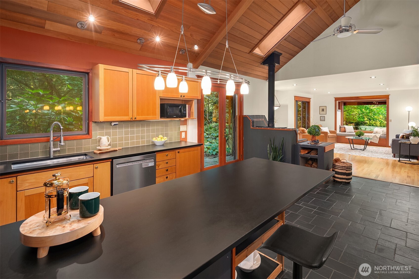 17804 Thorsen Road Southwest Vashon, WA 98070 - Photo 17 of 39 a kitchen with a sink and large windows