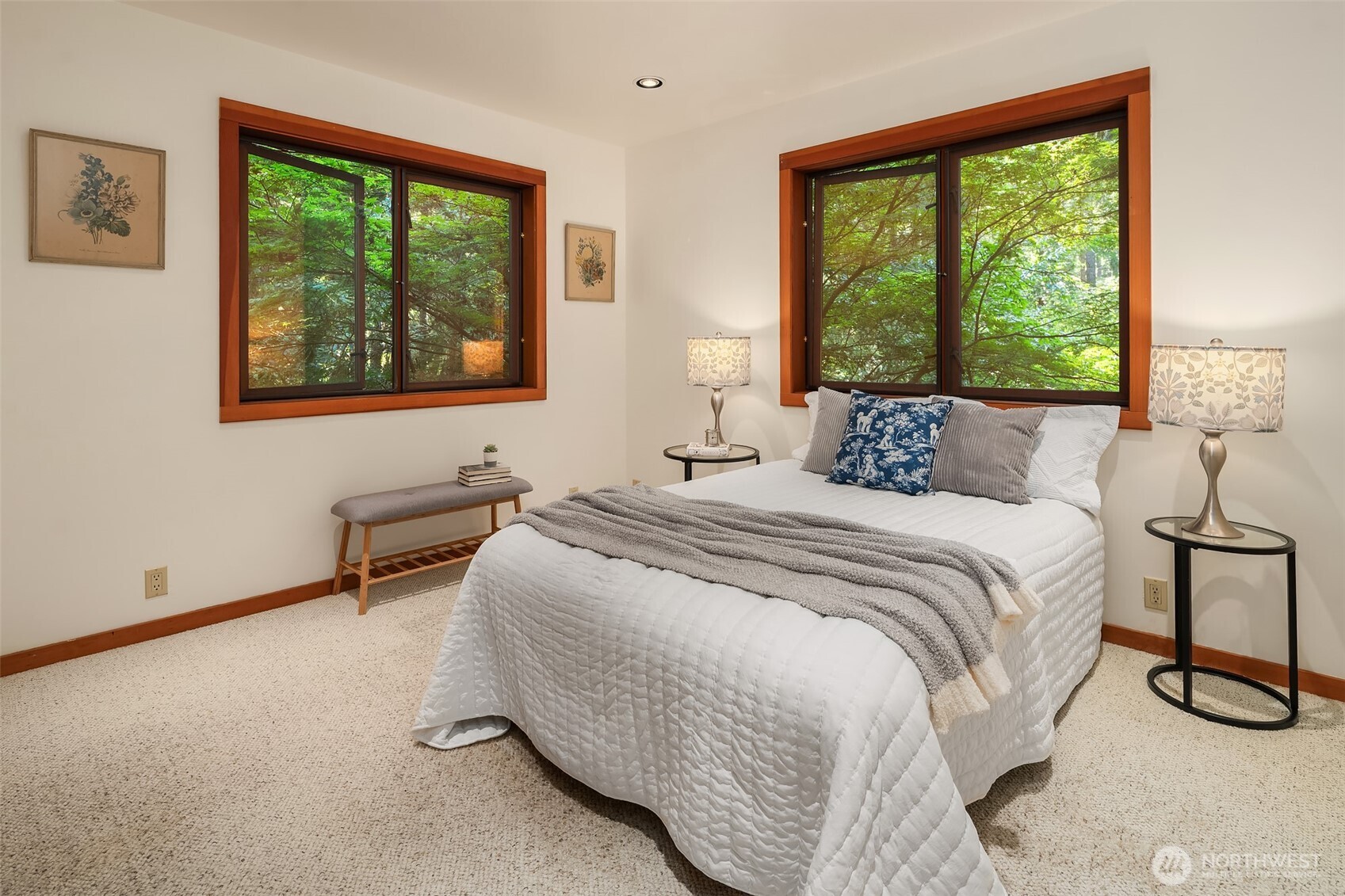 17804 Thorsen Road Southwest Vashon, WA 98070 - Photo 25 of 39 a bedroom with a bed and a window