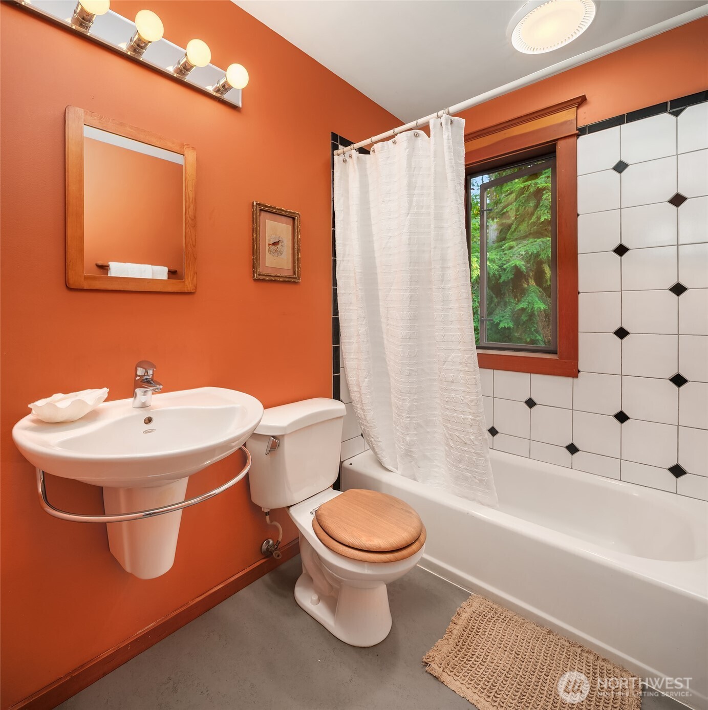 17804 Thorsen Road Southwest Vashon, WA 98070 - Photo 26 of 39 a bathroom with a sink toilet and shower