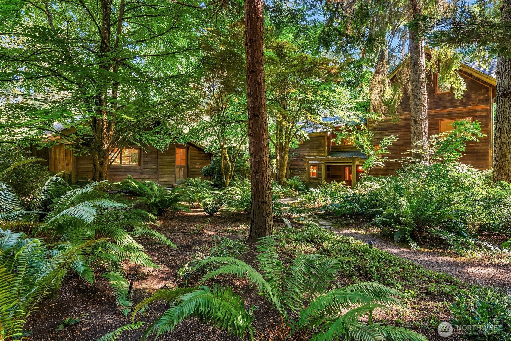 17804 Thorsen Road Southwest Vashon, WA 98070 - Photo 3 of 39 a view of a pathway of a building